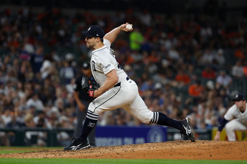 Sep 17, 2025; Detroit, Michigan, USA; Detroit Tigers relief pitcher Tommy Kahnle (43) throws during the seventh inning against the Cleveland Guardians at Comerica Park. Mandatory Credit: Brian Bradshaw Sevald-Imagn Images