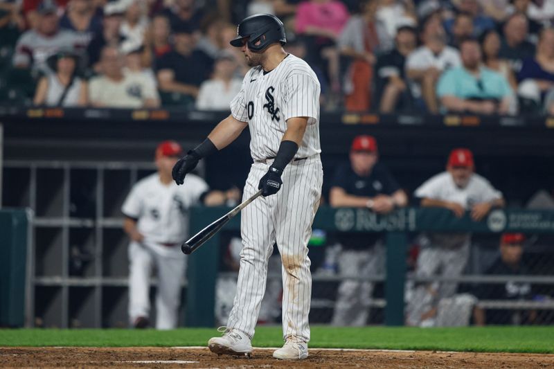 Jul 4, 2023; Chicago, Illinois, USA; Chicago White Sox third baseman Jake Burger (30) reacts after striking out against the Toronto Blue Jays during the ninth inning at Guaranteed Rate Field. Mandatory Credit: Kamil Krzaczynski-USA TODAY Sports