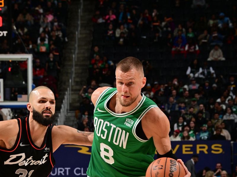 DETROIT, MI - MARCH 22: Kristaps Porzingis #8 of the Boston Celtics dribbles the ball during the game against the Detroit Pistons on March 22, 2024 at Little Caesars Arena in Detroit, Michigan. NOTE TO USER: User expressly acknowledges and agrees that, by downloading and/or using this photograph, User is consenting to the terms and conditions of the Getty Images License Agreement. Mandatory Copyright Notice: Copyright 2024 NBAE (Photo by Chris Schwegler/NBAE via Getty Images)