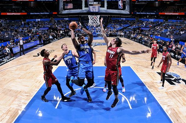 ORLANDO, FL - DECEMBER 20: Wendell Carter Jr. #34 of the Orlando Magic shoots the ball during the game against the Miami Heat on December 20, 2023 at the Kia Center in Orlando, Florida. NOTE TO USER: User expressly acknowledges and agrees that, by downloading and or using this photograph, User is consenting to the terms and conditions of the Getty Images License Agreement. Mandatory Copyright Notice: Copyright 2023 NBAE (Photo by Fernando Medina/NBAE via Getty Images)