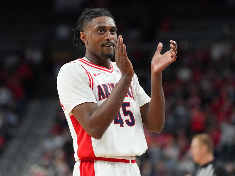 Mar 9, 2023; Las Vegas, NV, USA; Arizona Wildcats guard Cedric Henderson Jr. (45) applauds after the Wildcats defeated the Stanford Cardinal 95-84 at T-Mobile Arena. Mandatory Credit: Stephen R. Sylvanie-USA TODAY Sports