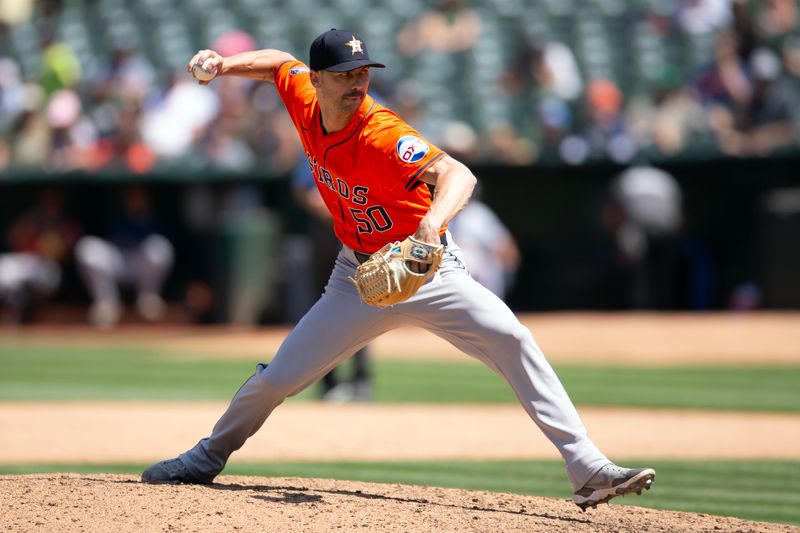 Jul 24, 2024; Oakland, California, USA; Houston Astros pitcher Tayler Scott (50) delivers against the Oakland Athletics during the eighth inning at Oakland-Alameda County Coliseum. Mandatory Credit: D. Ross Cameron-USA TODAY Sports