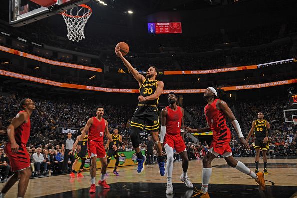 SAN FRANCISCO, CA - DECEMBER 23: Stephen Curry #30 of the Golden State Warriors shoots the ball during the game against the Portland Trail Blazers on December 23, 2023 at Chase Center in San Francisco, California. NOTE TO USER: User expressly acknowledges and agrees that, by downloading and or using this photograph, user is consenting to the terms and conditions of Getty Images License Agreement. Mandatory Copyright Notice: Copyright 2023 NBAE (Photo by Noah Graham/NBAE via Getty Images)