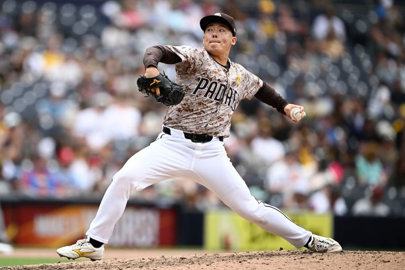 Jun 9, 2024; San Diego, California, USA; San Diego Padres relief pitcher Yuki Matsui (1) pitches during the ninth inning against the Arizona Diamondbacks at Petco Park. Mandatory Credit: Denis Poroy-USA TODAY Sports at Petco Park. 