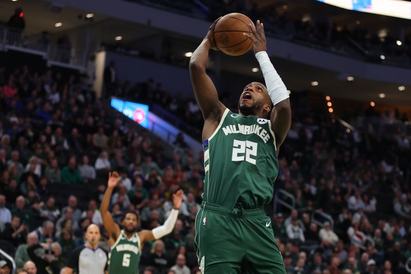 MILWAUKEE, WISCONSIN - JANUARY 24: Khris Middleton #22 of the Milwaukee Bucks takes a shot during the first half of a game against the Cleveland Cavaliers at Fiserv Forum on January 24, 2024 in Milwaukee, Wisconsin. NOTE TO USER: User expressly acknowledges and agrees that, by downloading and or using this photograph, User is consenting to the terms and conditions of the Getty Images License Agreement. (Photo by Stacy Revere/Getty Images)