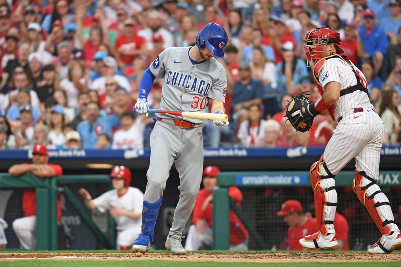 Jun 10, 2025; Philadelphia, Pennsylvania, USA; Chicago Cubs outfielder Kyle Tucker (30) reacts after striking out with the bases loaded against the Philadelphia Phillies to end the fourth inning at Citizens Bank Park. Mandatory Credit: Eric Hartline-Imagn Images