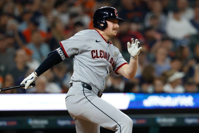 Sep 16, 2025; Detroit, Michigan, USA;  Cleveland Guardians first base Kyle Manzardo (9) hits a single in the sixth inning against the Detroit Tigers at Comerica Park. Mandatory Credit: Rick Osentoski-Imagn Images