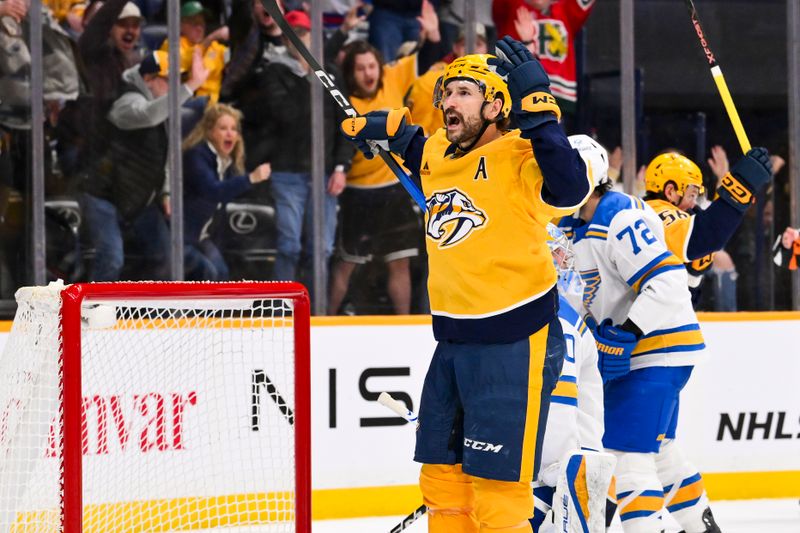 Feb 2, 2026; Nashville, Tennessee, USA;  Nashville Predators left wing Filip Forsberg (9) celebrates his goal against the St. Louis Blues during the second period at Bridgestone Arena. Mandatory Credit: Steve Roberts-Imagn Images