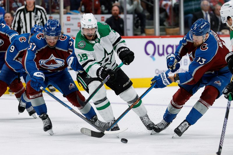 May 11, 2024; Denver, Colorado, USA; Dallas Stars center Craig Smith (15) controls the puck against Colorado Avalanche center Casey Mittelstadt (37) and right wing Valeri Nichushkin (13) in the third period in game three of the second round of the 2024 Stanley Cup Playoffs at Ball Arena. Mandatory Credit: Isaiah J. Downing-USA TODAY Sports