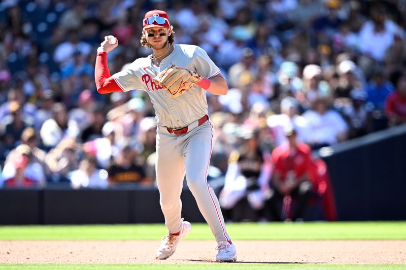 Apr 28, 2024; San Diego, California, USA; Philadelphia Phillies third baseman Alec Bohm (28) throws to first base on a ground out by San Diego Padres shortstop Ha-Seong Kim (not pictured) during the eighth inning at Petco Park. Mandatory Credit: Orlando Ramirez-USA TODAY Sports