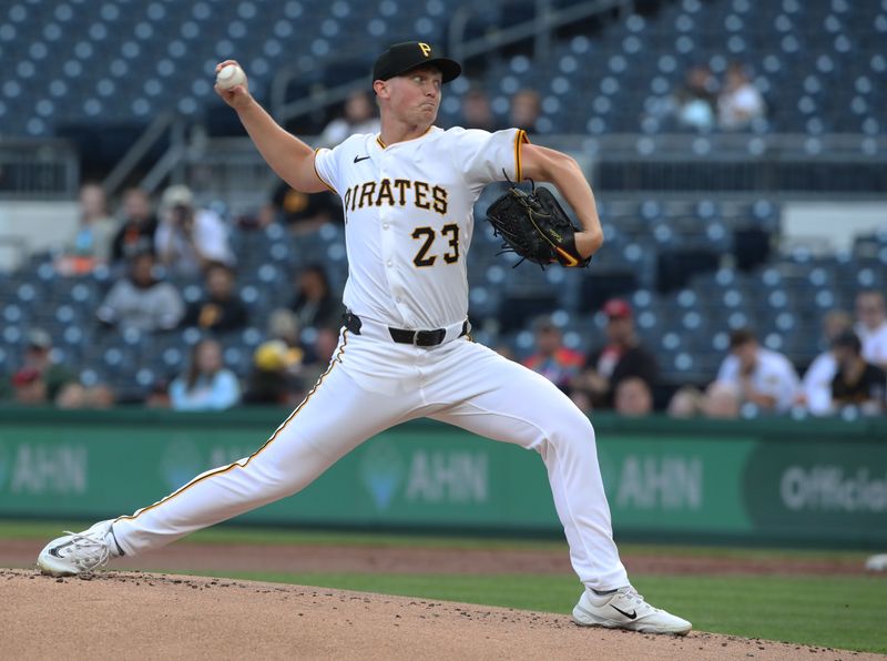 May 19, 2025; Pittsburgh, Pennsylvania, USA;  Pittsburgh Pirates starting pitcher Mitch Keller (23) delivers a pitch against the Cincinnati Reds during the first inning at PNC Park. Mandatory Credit: Charles LeClaire-Imagn Images