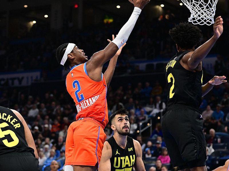 OKLAHOMA CITY, OKLAHOMA - DECEMBER 11: Shai Gilgeous-Alexander #2 of the Oklahoma City Thunder goes up for a layup in the second half against the Utah Jazz at Paycom Center on December 11, 2023 in Oklahoma City, Oklahoma. NOTE TO USER: User expressly acknowledges and agrees that, by downloading and or using this Photograph, user is consenting to the terms and conditions of the Getty Images License Agreement. (Photo by Joshua Gateley/Getty Images)