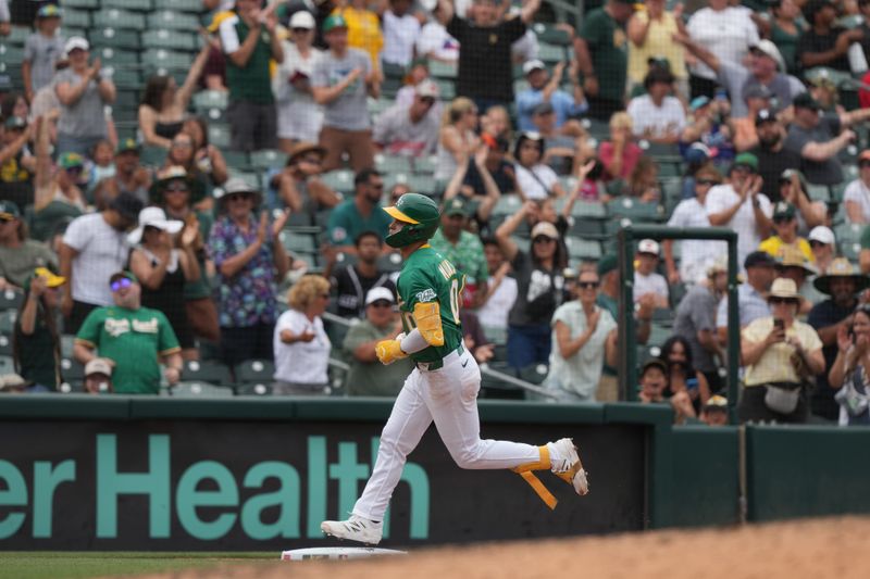 Jun 8, 2025; West Sacramento, California, USA; Athletics third baseman Max Muncy (10) rounds the bases after hitting a home run against the Baltimore Orioles during the eighth inning at Sutter Health Park. Mandatory Credit: Darren Yamashita-Imagn Images