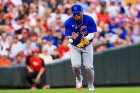 Reds' Top Performer Sets the Stage for a Showdown Against Cubs at Wrigley Field