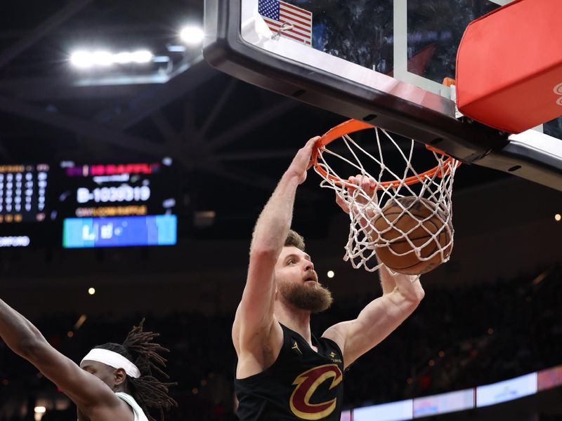 CLEVELAND, OH - MARCH 5: Dean Wade #32 of the Cleveland Cavaliers dunks the ball during the game against the Boston Celtics on March 5, 2024 at Rocket Mortgage FieldHouse in Cleveland, Ohio. NOTE TO USER: User expressly acknowledges and agrees that, by downloading and/or using this Photograph, user is consenting to the terms and conditions of the Getty Images License Agreement. Mandatory Copyright Notice: Copyright 2024 NBAE (Photo by Lauren Leigh Bacho<p><br/></p>/NBAE via Getty Images)