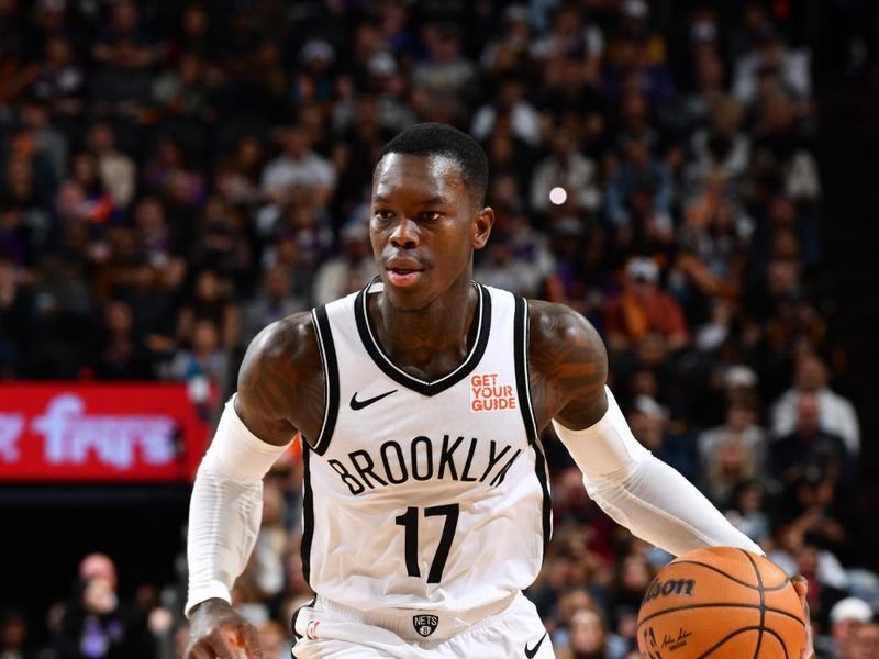 PHOENIX, AZ - NOVEMBER 27: Dennis Schroder #17 of the Brooklyn Nets drives to the basket during the game against the Phoenix Suns on November 27, 2024 at Footprint Center in Phoenix, Arizona. NOTE TO USER: User expressly acknowledges and agrees that, by downloading and or using this photograph, user is consenting to the terms and conditions of the Getty Images License Agreement. Mandatory Copyright Notice: Copyright 2024 NBAE (Photo by Barry Gossage/NBAE via Getty Images)