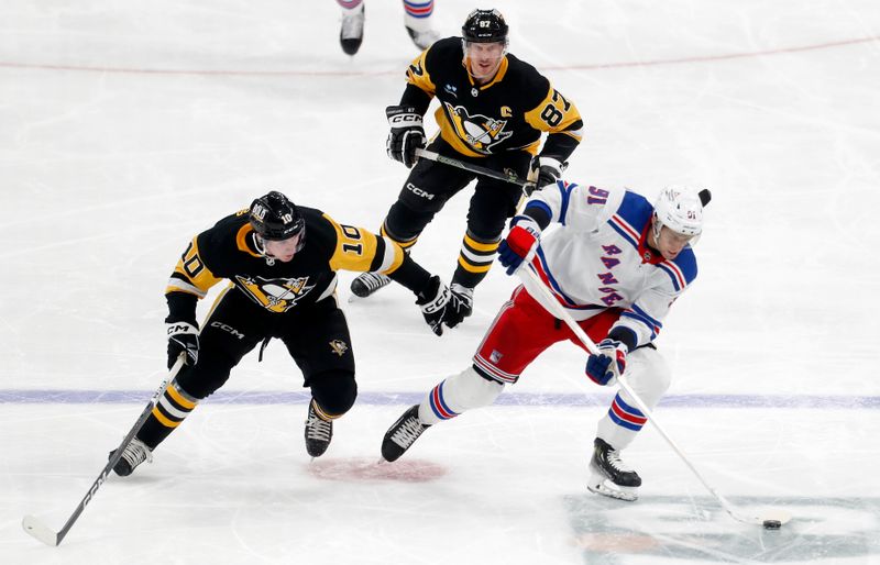 Mar 16, 2024; Pittsburgh, Pennsylvania, USA;  New York Rangers center Alex Wennberg (91) moves the puck against Pittsburgh Penguins left wing Drew O'Connor (10) and center Sidney Crosby (87) during the third period at PPG Paints Arena. New York won 7-4.  Mandatory Credit: Charles LeClaire-USA TODAY Sports