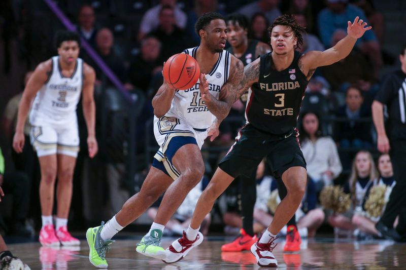 Mar 2, 2024; Atlanta, Georgia, USA; Georgia Tech Yellow Jackets forward Tyzhaun Claude (12) is defended by Florida State Seminoles forward Cam Corhen (3) in the first half at McCamish Pavilion. Mandatory Credit: Brett Davis-USA TODAY Sports