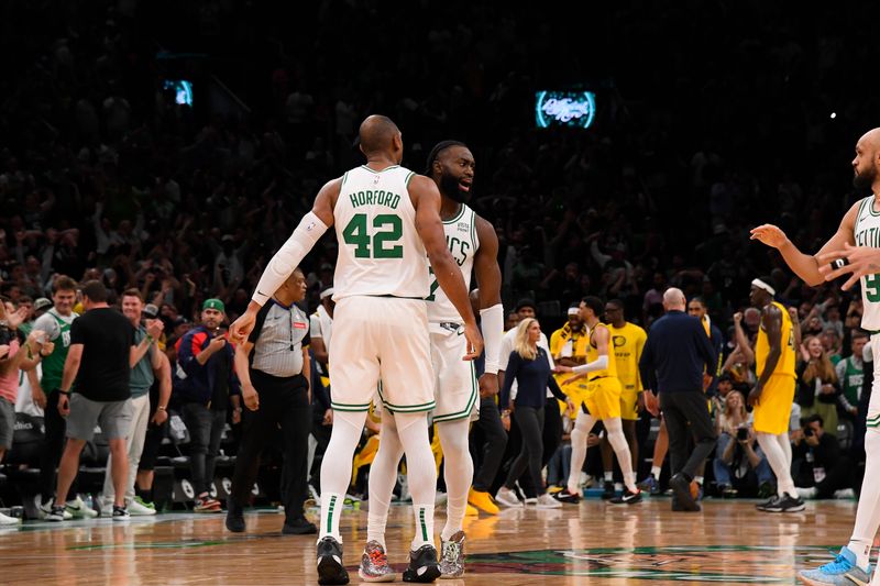 BOSTON, MA - MAY 21: Jaylen Brown #7 of the Boston Celtics celebrates after scoring the game tying shot during the game against the Indiana Pacers during Game 1 of the Eastern Conference Finals of the 2024 NBA Playoffs on May 21, 2024 at the TD Garden in Boston, Massachusetts. NOTE TO USER: User expressly acknowledges and agrees that, by downloading and or using this photograph, User is consenting to the terms and conditions of the Getty Images License Agreement. Mandatory Copyright Notice: Copyright 2024 NBAE  (Photo by Brian Babineau/NBAE via Getty Images)