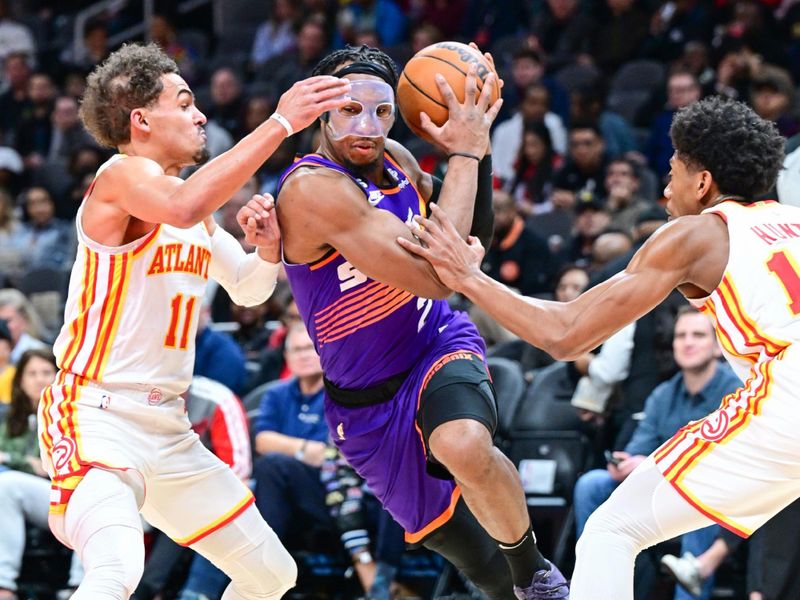 ATLANTA, GA - FEBUARY 9: Josh Okogie #2 of the Phoenix Suns goes to the basket during the game  on Febuary 9, 2023 at State Farm Arena in Atlanta, Georgia.  NOTE TO USER: User expressly acknowledges and agrees that, by downloading and/or using this Photograph, user is consenting to the terms and conditions of the Getty Images License Agreement. Mandatory Copyright Notice: Copyright 2023 NBAE (Photo by Adam Hagy/NBAE via Getty Images)