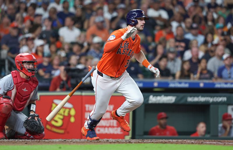 Sep 20, 2024; Houston, Texas, USA; Houston Astros right fielder Kyle Tucker (30) hits a single during the third inning against the Los Angeles Angels at Minute Maid Park. Mandatory Credit: Troy Taormina-Imagn Images