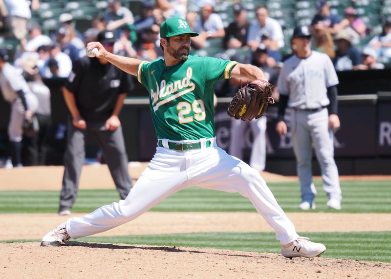 Jun 29, 2023; Oakland, California, USA; Oakland Athletics relief pitcher Austin Pruitt (29) pitches the ball against the New York Yankees during the ninth inning at Oakland-Alameda County Coliseum. Mandatory Credit: Kelley L Cox-USA TODAY Sports