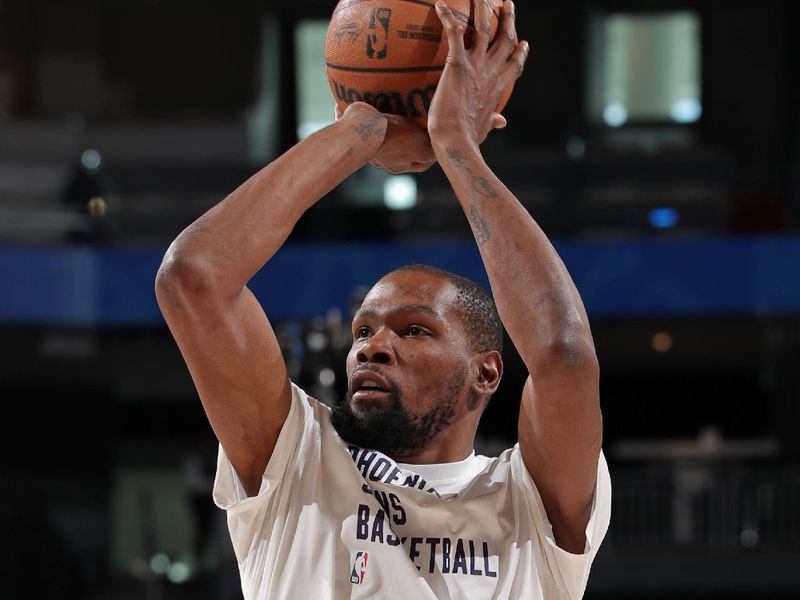 MILWAUKEE, WI - MARCH 17: Kevin Durant #35 of the Phoenix Suns warms up before the game against the Milwaukee Bucks on March 17, 2024 at the Fiserv Forum Center in Milwaukee, Wisconsin. NOTE TO USER: User expressly acknowledges and agrees that, by downloading and or using this Photograph, user is consenting to the terms and conditions of the Getty Images License Agreement. Mandatory Copyright Notice: Copyright 2024 NBAE (Photo by Gary Dineen/NBAE via Getty Images).