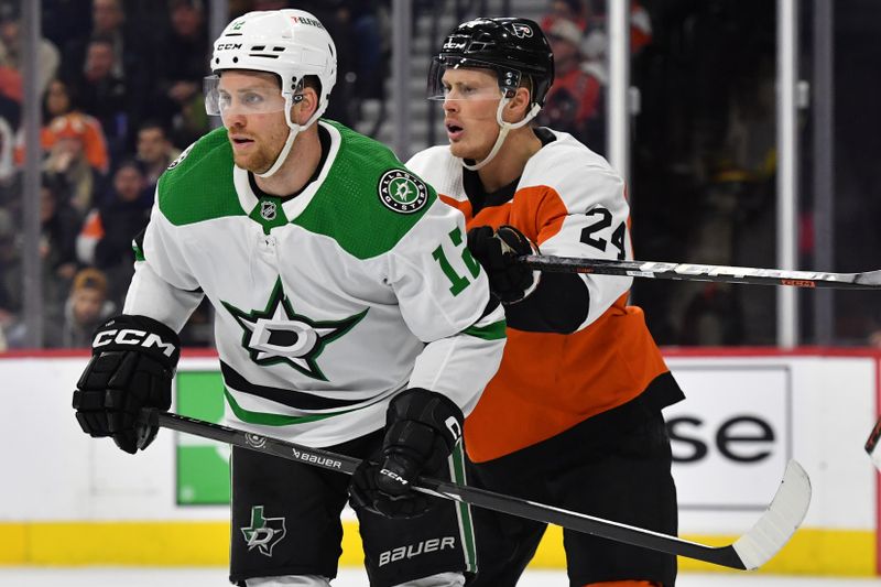 Jan 18, 2024; Philadelphia, Pennsylvania, USA; Dallas Stars center Radek Faksa (12) and Philadelphia Flyers defenseman Nick Seeler (24) battle for position during the second period at Wells Fargo Center. Mandatory Credit: Eric Hartline-USA TODAY Sports