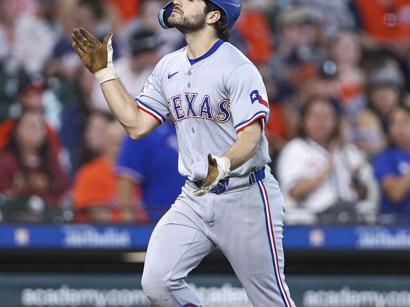 Jul 14, 2024; Houston, Texas, USA; Texas Rangers third baseman Josh Smith (8) rounds the bases after hitting a home run during the eighth inning against the Houston Astros at Minute Maid Park. Mandatory Credit: Troy Taormina-USA TODAY Sports