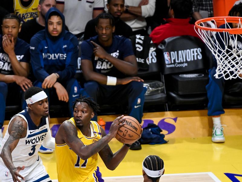 LOS ANGELES, CA - APRIL 22: Dorian Finney-Smith #17 of the Los Angeles Lakers handles the ball during the game against the Minnesota Timberwolves during Round One Game Two of the 2025 NBA Playoffs on April 22, 2025 at Crypto.Com Arena in Los Angeles, California. NOTE TO USER: User expressly acknowledges and agrees that, by downloading and/or using this Photograph, user is consenting to the terms and conditions of the Getty Images License Agreement. Mandatory Copyright Notice: Copyright 2025 NBAE (Photo by Juan Ocampo/NBAE via Getty Images)