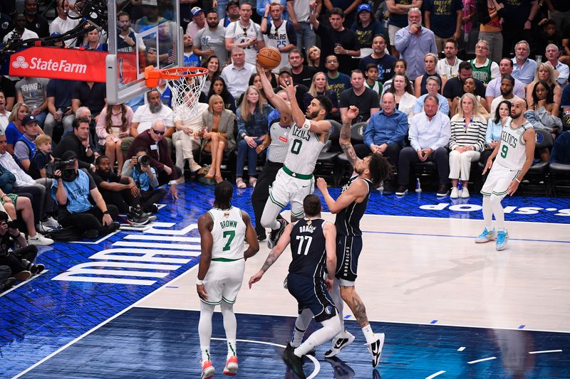 DALLAS, TX - JUNE 12: Jayson Tatum #0 of the Boston Celtics drives to the basket during the game against the Dallas Mavericks during Game 3 of the 2024 NBA Finals on June 12, 2024 at the American Airlines Center in Dallas, Texas. NOTE TO USER: User expressly acknowledges and agrees that, by downloading and or using this photograph, User is consenting to the terms and conditions of the Getty Images License Agreement. Mandatory Copyright Notice: Copyright 2024 NBAE (Photo by Brian Babineau/NBAE via Getty Images)