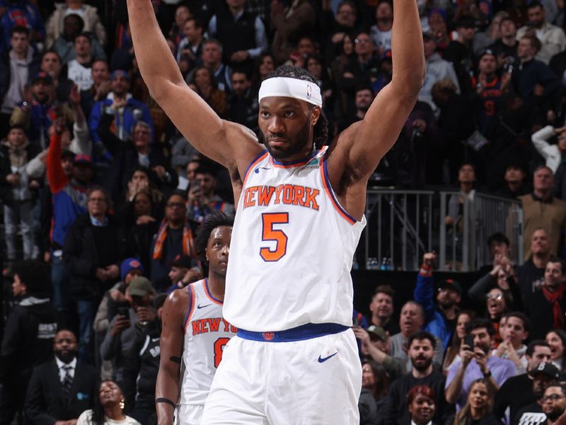 BROOKLYN, NY - JANUARY 23: Precious Achiuwa #5 of the New York Knicks celebrates during the game against the Brooklyn Nets on January 23, 2024 at Barclays Center in Brooklyn, New York. NOTE TO USER: User expressly acknowledges and agrees that, by downloading and or using this Photograph, user is consenting to the terms and conditions of the Getty Images License Agreement. Mandatory Copyright Notice: Copyright 2024 NBAE (Photo by Nathaniel S. Butler/NBAE via Getty Images)