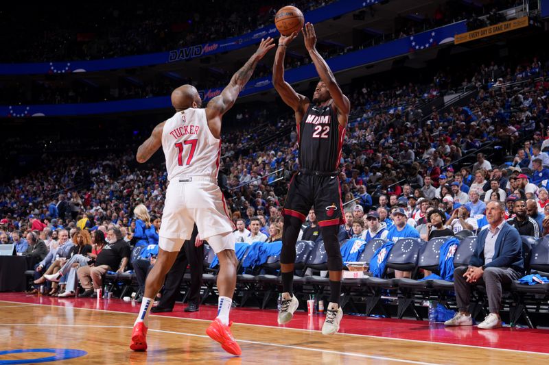 PHILADELPHIA, PA - APRIL 6: Jimmy Butler #22 of the Miami Heat shoots a three point basket during the game against the Philadelphia 76ers on April 6, 2023 at the Wells Fargo Center in Philadelphia, Pennsylvania NOTE TO USER: User expressly acknowledges and agrees that, by downloading and/or using this Photograph, user is consenting to the terms and conditions of the Getty Images License Agreement. Mandatory Copyright Notice: Copyright 2023 NBAE (Photo by Jesse D. Garrabrant/NBAE via Getty Images)