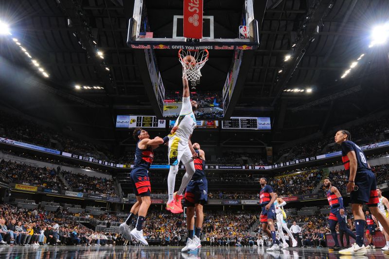 INDIANAPOLIS, IN - NOVEMBER 24: Myles Turner #33 of the Indiana Pacers dunks the ball during the game against the Washington Wizards on November 24, 2024 at Gainbridge Fieldhouse in Indianapolis, Indiana. NOTE TO USER: User expressly acknowledges and agrees that, by downloading and or using this Photograph, user is consenting to the terms and conditions of the Getty Images License Agreement. Mandatory Copyright Notice: Copyright 2024 NBAE (Photo by Ron Hoskins/NBAE via Getty Images)