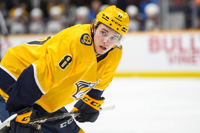 Nov 20, 2023; Nashville, Tennessee, USA; Nashville Predators center Cody Glass (8) awaits the face off against the Colorado Avalanche during the third period at Bridgestone Arena. Mandatory Credit: Steve Roberts-USA TODAY Sports