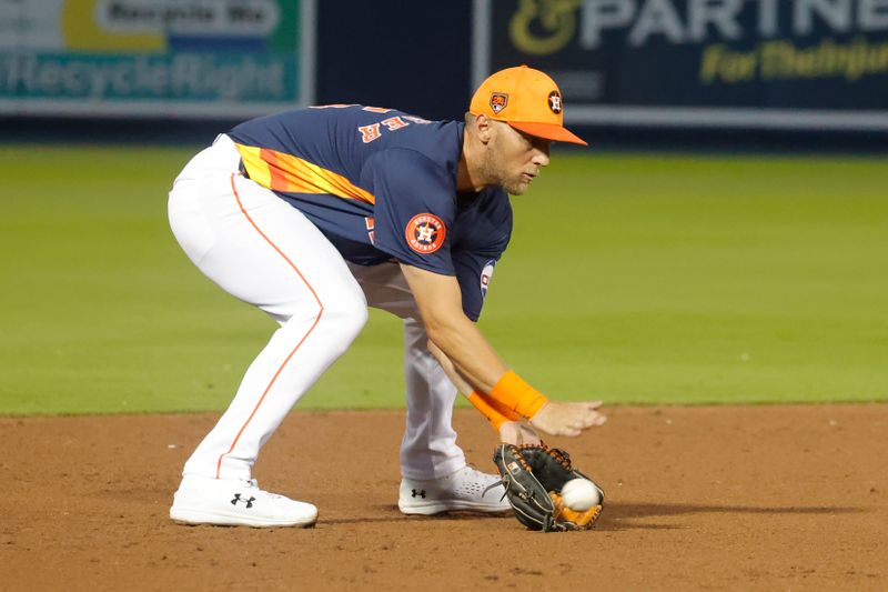 Mar 15, 2024; West Palm Beach, Florida, USA; Houston Astros shortstop Grae Kessinger (16) fields a ground ball during the sixth inning at The Ballpark of the Palm Beaches. Mandatory Credit: Reinhold Matay-USA TODAY Sports