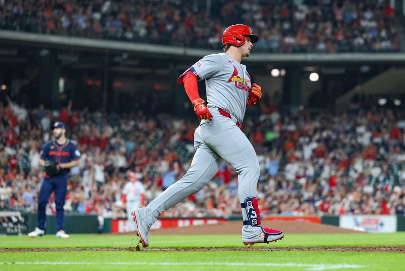 Jun 3, 2024; Houston, Texas, USA; Houston Astros starting pitcher Justin Verlander (35) reacts and St. Louis Cardinals second baseman Nolan Gorman (16) rounds the bases after hitting a home run during the fifth inning at Minute Maid Park. Mandatory Credit: Troy Taormina-USA TODAY Sports