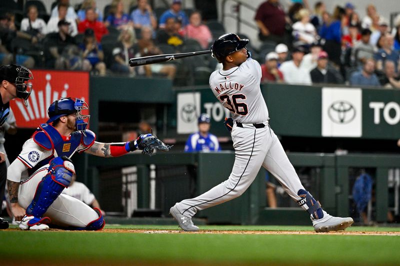 Jun 3, 2024; Arlington, Texas, USA; Detroit Tigers designated hitter Justyn-Henry Malloy (36) flies out to center field during his first major league at bat during the second inning against the Texas Rangers at Globe Life Field. Mandatory Credit: Jerome Miron-USA TODAY Sports