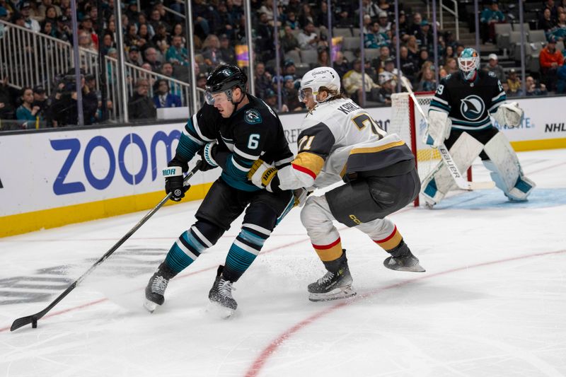 Feb 19, 2024; San Jose, California, USA; San Jose Sharks defenseman Ty Emberson (6) controls the puck against Vegas Golden Knights center William Karlsson (71) during the third period at SAP Center at San Jose. Mandatory Credit: Neville E. Guard-USA TODAY Sports