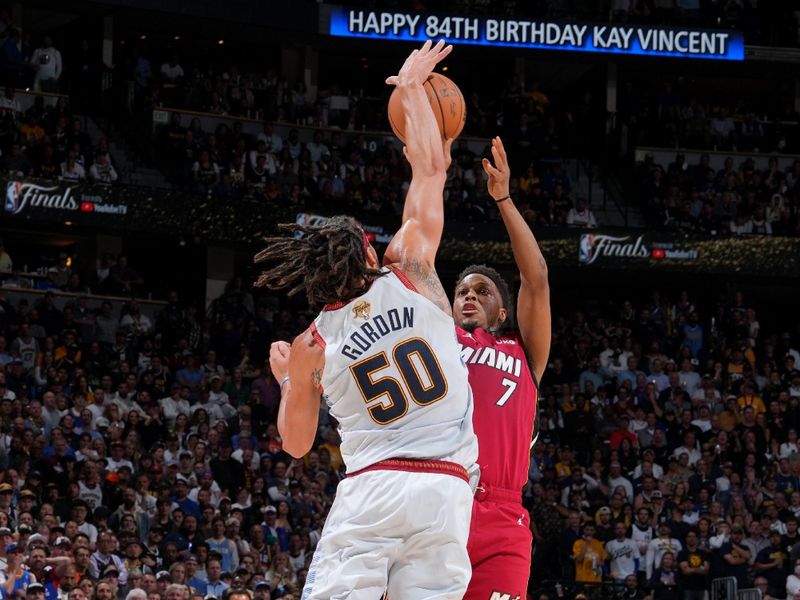 DENVER, CO - JUNE 12: Aaron Gordon #50 of the Denver Nuggets blocks Kyle Lowry #7 of the Miami Heat during Game Five of the 2023 NBA Finals on June 12, 2023 at Ball Arena in Denver, Colorado. NOTE TO USER: User expressly acknowledges and agrees that, by downloading and or using this Photograph, user is consenting to the terms and conditions of the Getty Images License Agreement. Mandatory Copyright Notice: Copyright 2023 NBAE (Photo by Jesse D. Garrabrant/NBAE via Getty Images)