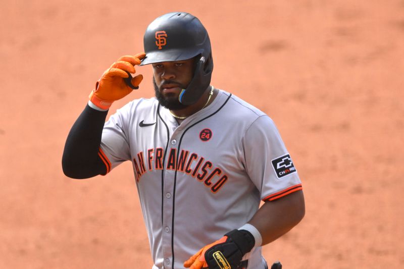 Jul 6, 2024; Cleveland, Ohio, USA; San Francisco Giants center fielder Heliot Ramos (17) celebrates his single in the fifth inning against the Cleveland Guardians at Progressive Field. Mandatory Credit: David Richard-USA TODAY Sports