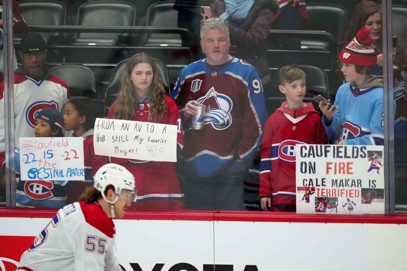 Mar 26, 2024; Denver, Colorado, USA; Montreal Canadiens and Colorado Avalanche fans before the game at Ball Arena. Mandatory Credit: Ron Chenoy-USA TODAY Sports