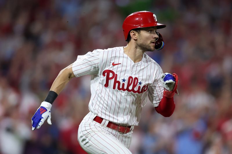 Oct 4, 2023; Philadelphia, Pennsylvania, USA; Philadelphia Phillies shortstop Trea Turner (7) runs toward first base after hitting a RBI single against the Miami Marlins during the third inning for game two of the Wildcard series for the 2023 MLB playoffs at Citizens Bank Park. Mandatory Credit: Bill Streicher-USA TODAY Sports