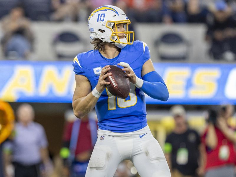 Los Angeles Chargers quarterback Justin Herbert (10) drops back to pass against the Chicago Bears in an NFL football game, Sunday, Oct. 29, 2023, in Inglewood, Calif. Chargers defeated the Bears 30-13. (AP Photo/Jeff Lewis)