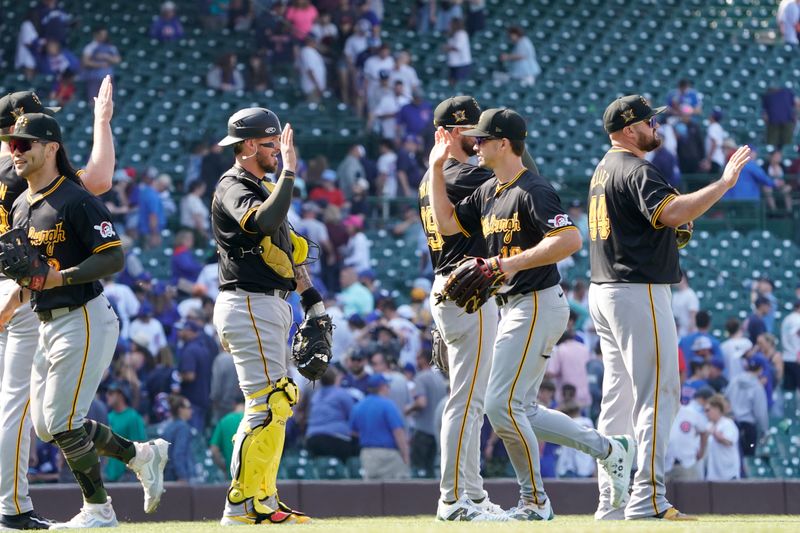 May 17, 2024; Chicago, Illinois, USA; The Pittsburgh Pirates celebrate after defeating the Chicago Cubs at Wrigley Field. Mandatory Credit: David Banks-USA TODAY Sports