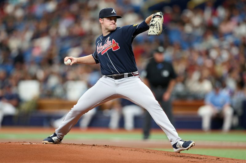 Jul 9, 2023; St. Petersburg, Florida, USA;  Atlanta Braves starting pitcher Bryce Elder (55) throws a pitch against the Tampa Bay Rays in the first inning at Tropicana Field. Mandatory Credit: Nathan Ray Seebeck-USA TODAY Sports