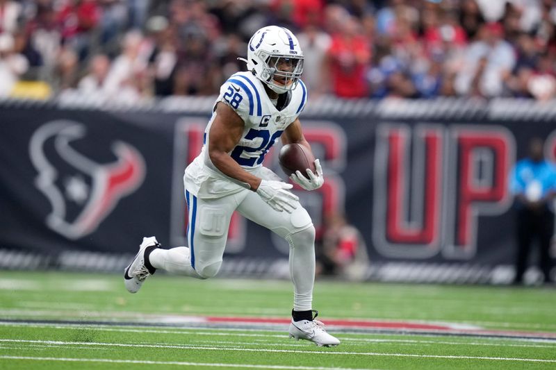 Indianapolis Colts running back Jonathan Taylor (28) runs up field during the second half of an NFL football game against the Houston Texans, Sunday, Oct. 27, 2024, in Houston. (AP Photo/Eric Christian Smith)