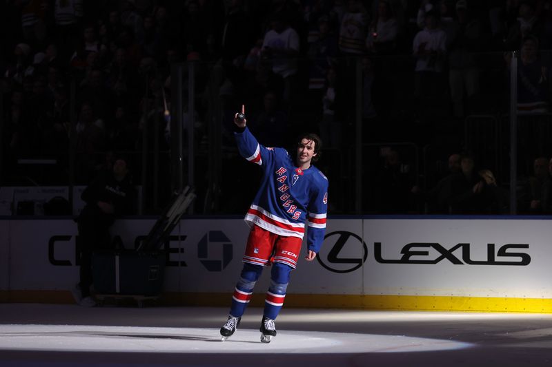 Mar 27, 2026; New York, New York, USA; New York Rangers defenseman Drew Fortescue (45) reacts after being named third star of the game after defeating the Chicago Blackhawks at Madison Square Garden. Mandatory Credit: Brad Penner-Imagn Images