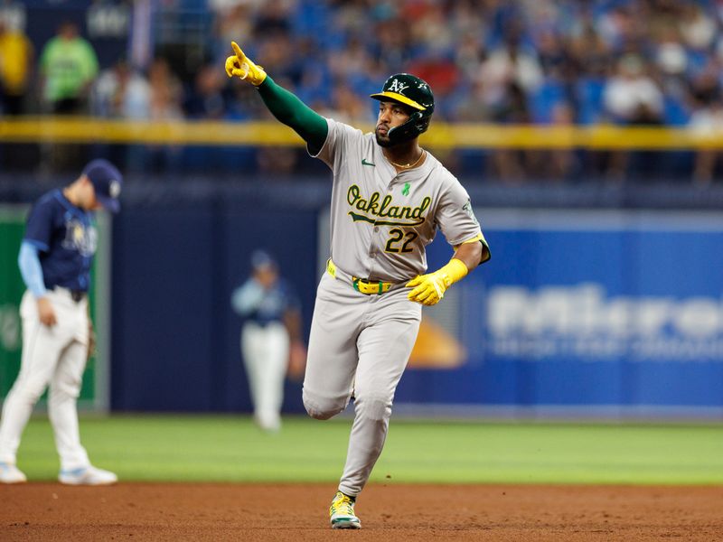 May 28, 2024; St. Petersburg, Florida, USA;  Oakland Athletics outfielder Miguel Andujar (22) runs the bases after hitting a three-run home run against the Tampa Bay Rays in the sixth inning  at Tropicana Field. Mandatory Credit: Nathan Ray Seebeck-USA TODAY Sports