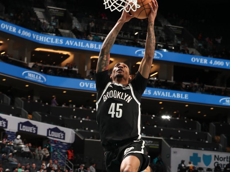 CHARLOTTE, NC - JANUARY 29:  Keon Johnson #45 of the Brooklyn Nets drives to the basket during the game against the Charlotte Hornets on January 29, 2025 at Spectrum Center in Charlotte, North Carolina. NOTE TO USER: User expressly acknowledges and agrees that, by downloading and or using this photograph, User is consenting to the terms and conditions of the Getty Images License Agreement. Mandatory Copyright Notice: Copyright 2025 NBAE (Photo by Kent Smith/NBAE via Getty Images)